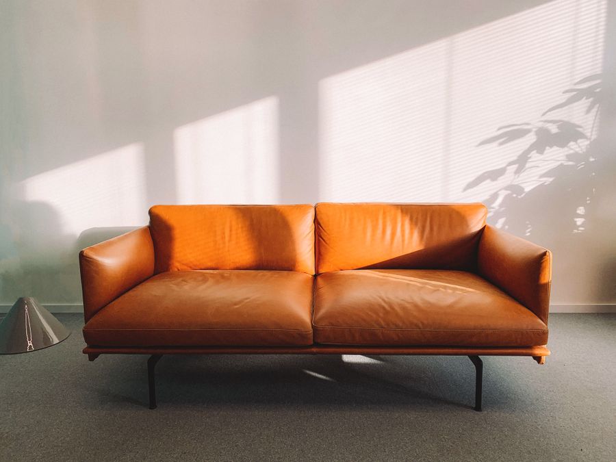 Tan leather sofa for professional leather cleaning